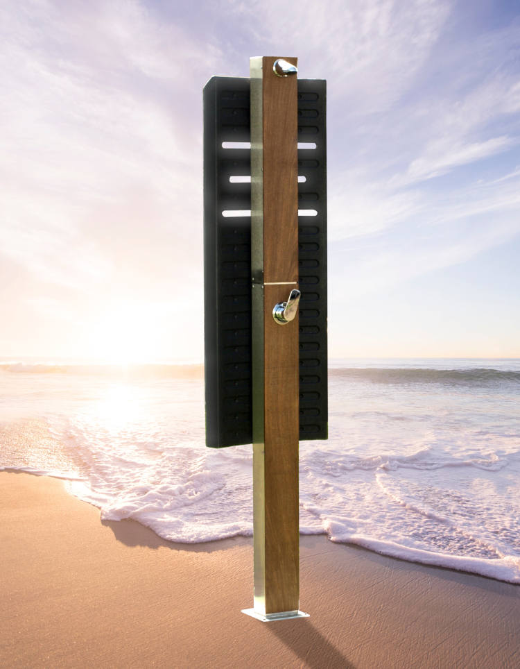The solar shower Solstar presented on a beach.